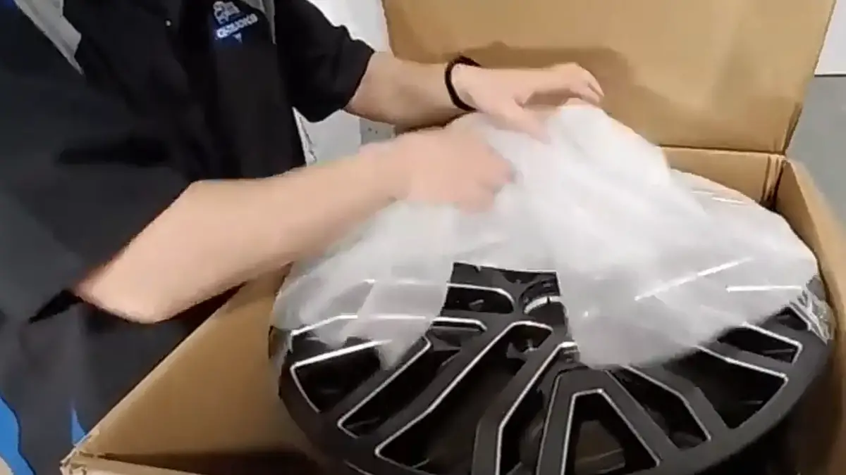 zane unwraps wheel parts