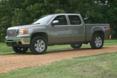 295/55/20 Nitto Trails / Stock GMC 20's