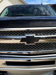 wrapped chevy emblem in carbon fiber