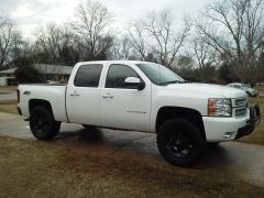 2013 silverado with black xd revolvers