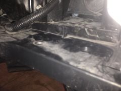 Behind passenger fender