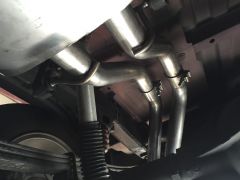 Two side exit pipes out of muffler