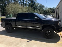 2017 GMC Sierra 1500 Denali Crew Cab with 2.5" RC level kit with 305/55r20 ridge grapplers