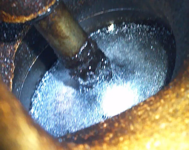 Intake manifold off with pics of intake valves with deposits. 2014