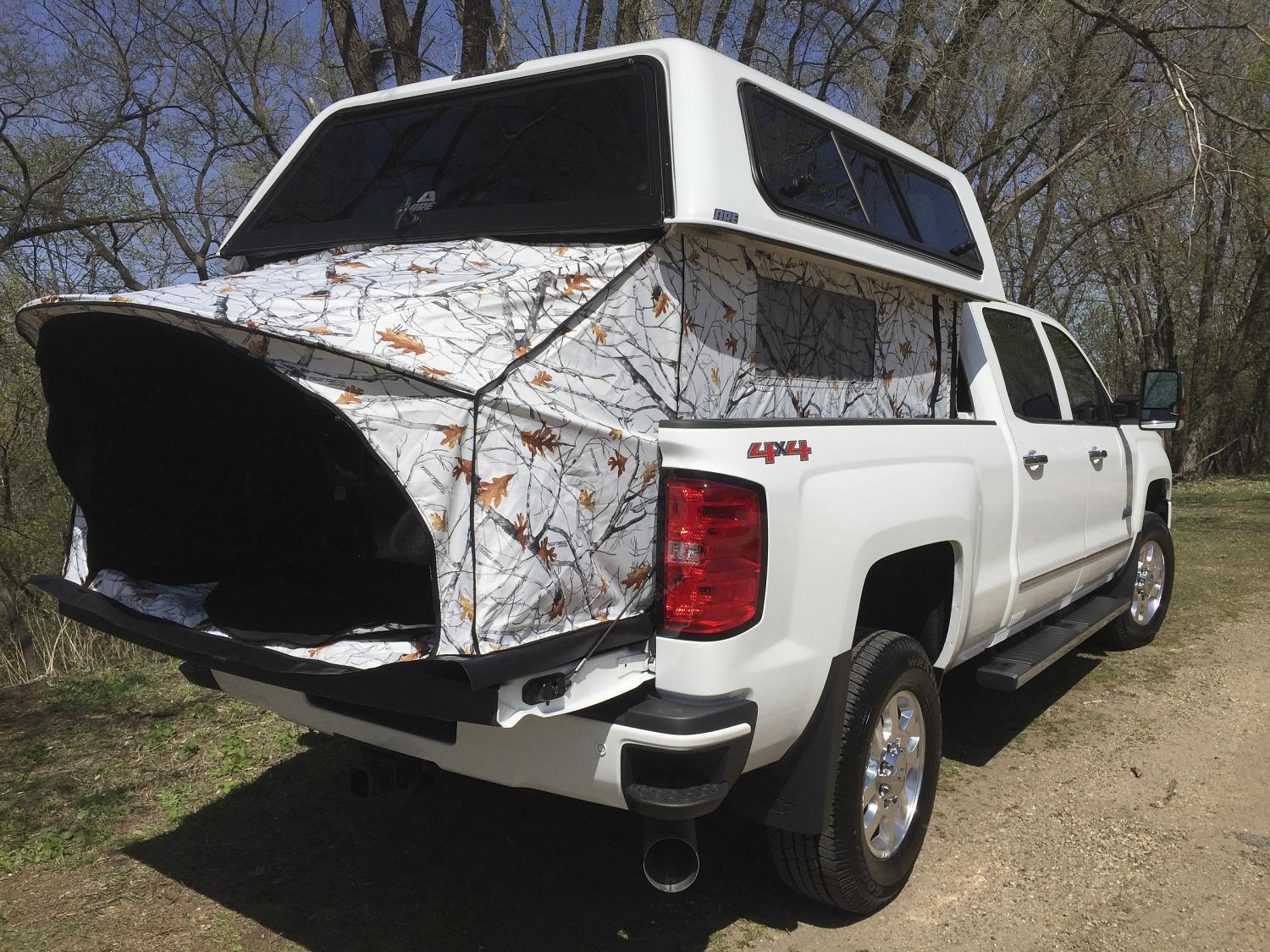 More information about "Camping in your truck made easy with power cap lift"