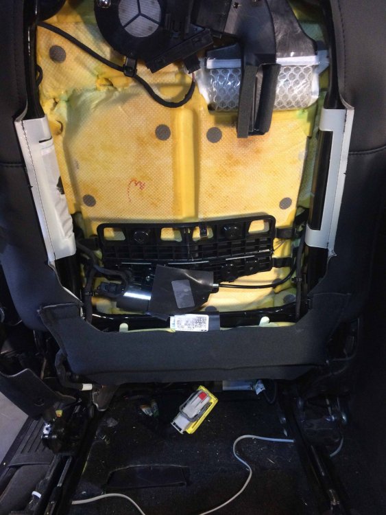 Rear of driver's seat with back panel removed