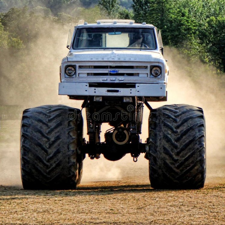 vintage-chevrolet-monster-truck-racing-dust-pickup-old-chevy-logo-huge-tires-speed-dirt-track-making-43438573.jpg