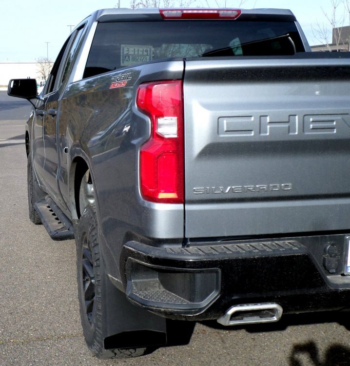 2019 Chevy 1500 drivers side from back black weights smooth look.JPG
