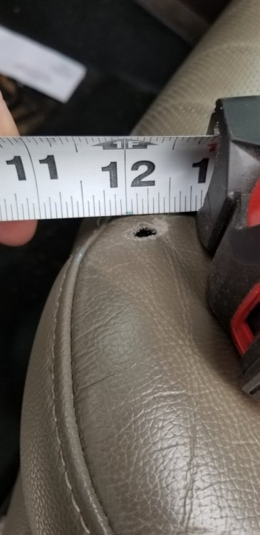hole in front seat.jpg