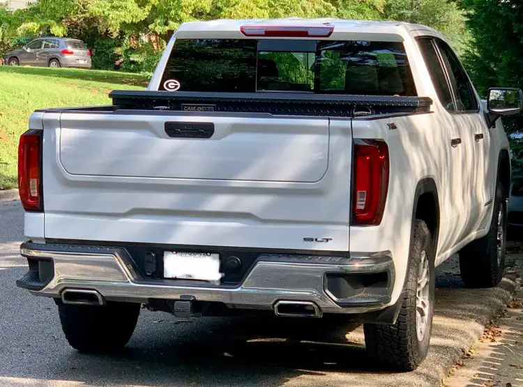 My GMC tailgate emblem—crooked from the factory 20192025 Chevy