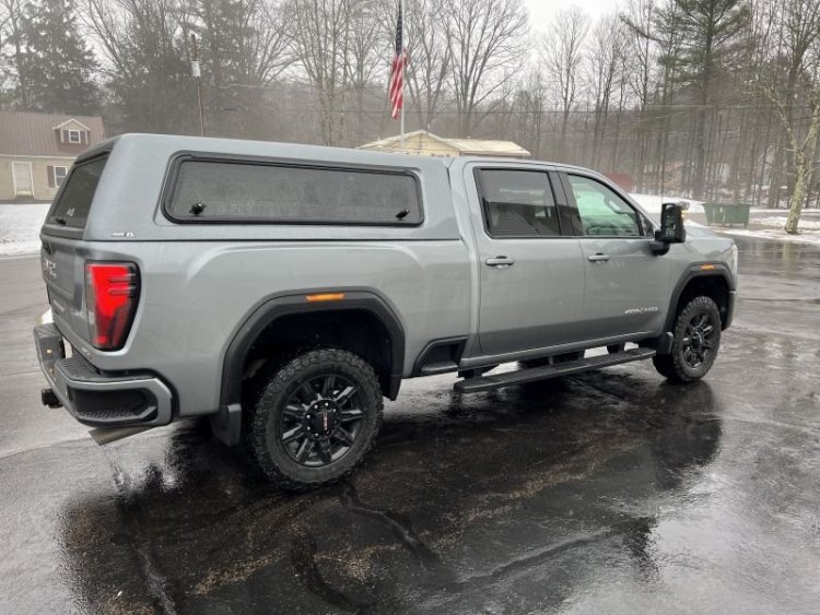 2024 GMC Sierra 2500HD AT4 with ARE cap.jpg