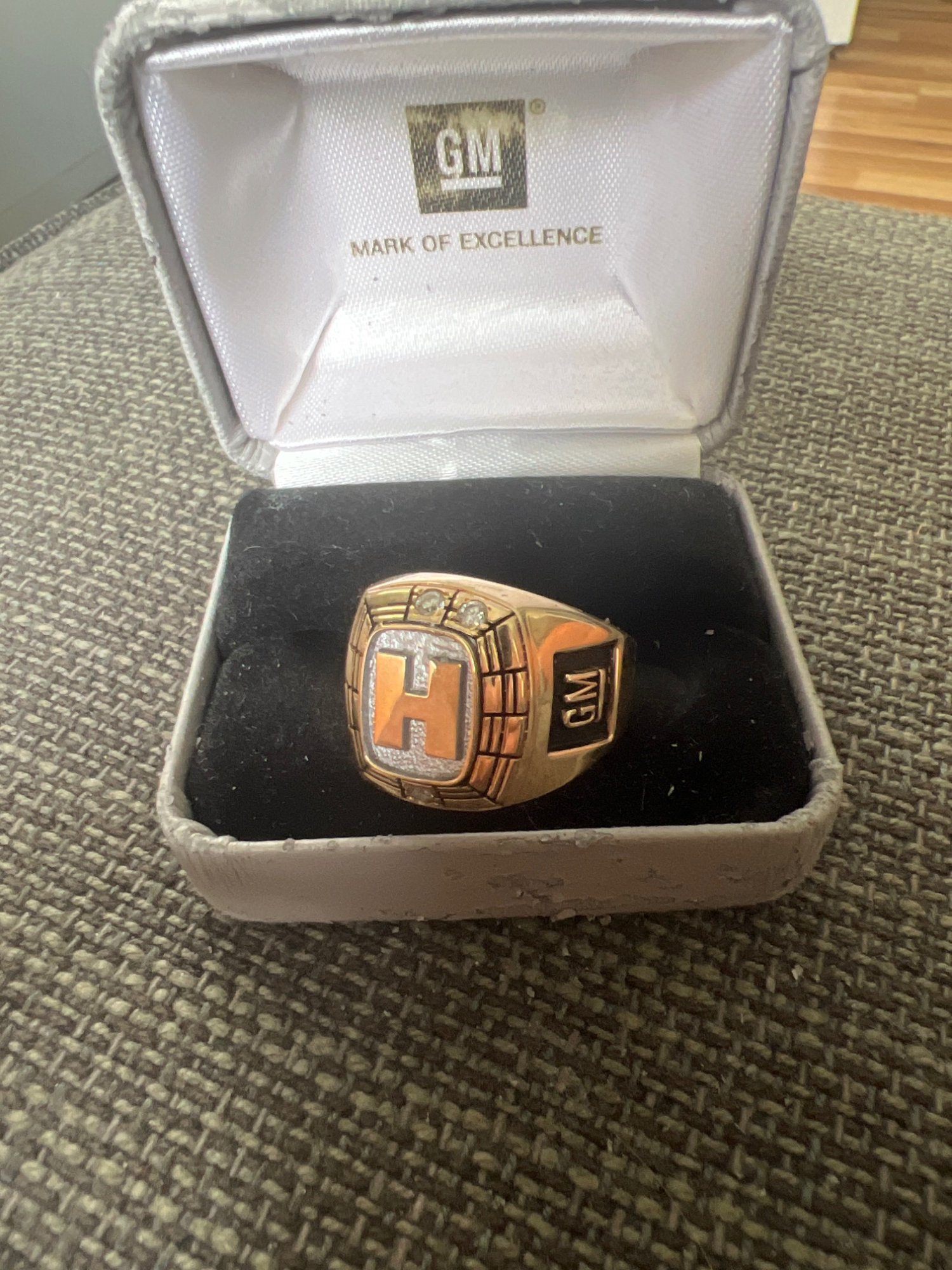 Gm mark of excellence ring for sale outlet