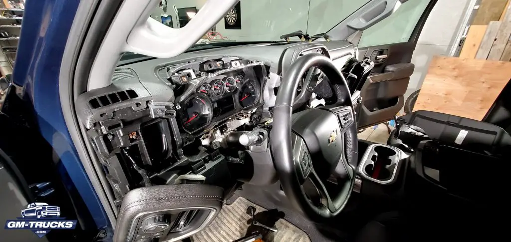 WAMS Teases 2022+ Silverado & Sierra Cluster & Steering Wheel Upgrades 2 I dissasembled interior of a 2019 Chevrolet Silverado while undergoing a digital gauge cluster upgrade