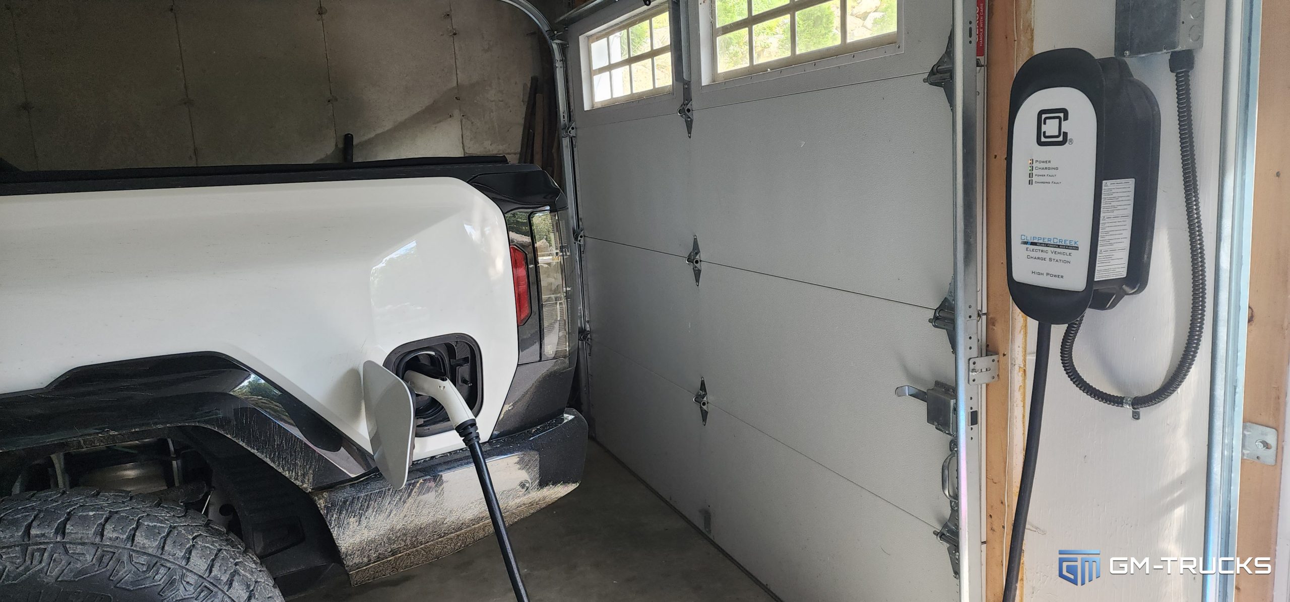 GMC HUMMER EV Plugged Into A Level 2 Charger