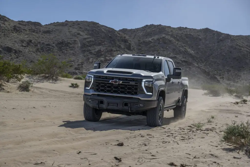 The 2024 Silverado HD ZR2 Bison in motion driving through the desert