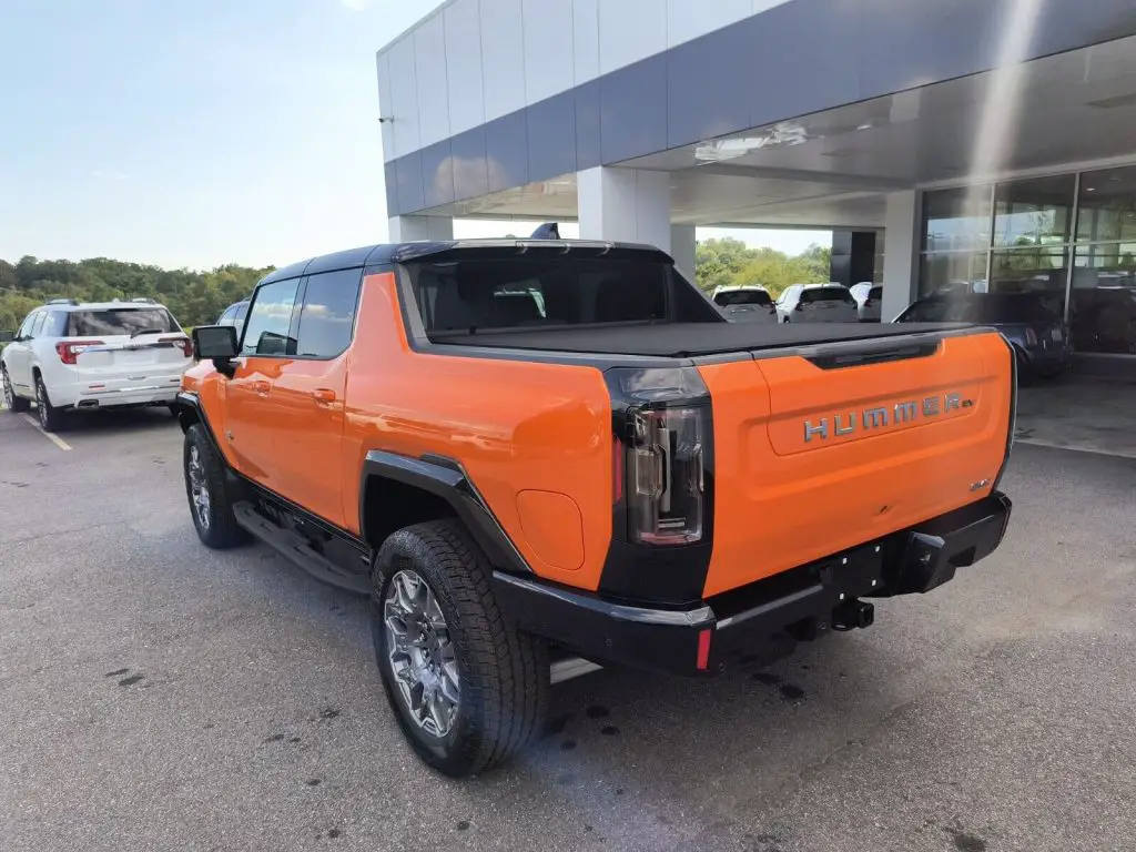 Very First HUMMER EV 3X Pickups Hit Dealership Lots... and eBay 3 2023 GMC HUMMER EV 3X Pickup in Afterburner Orange