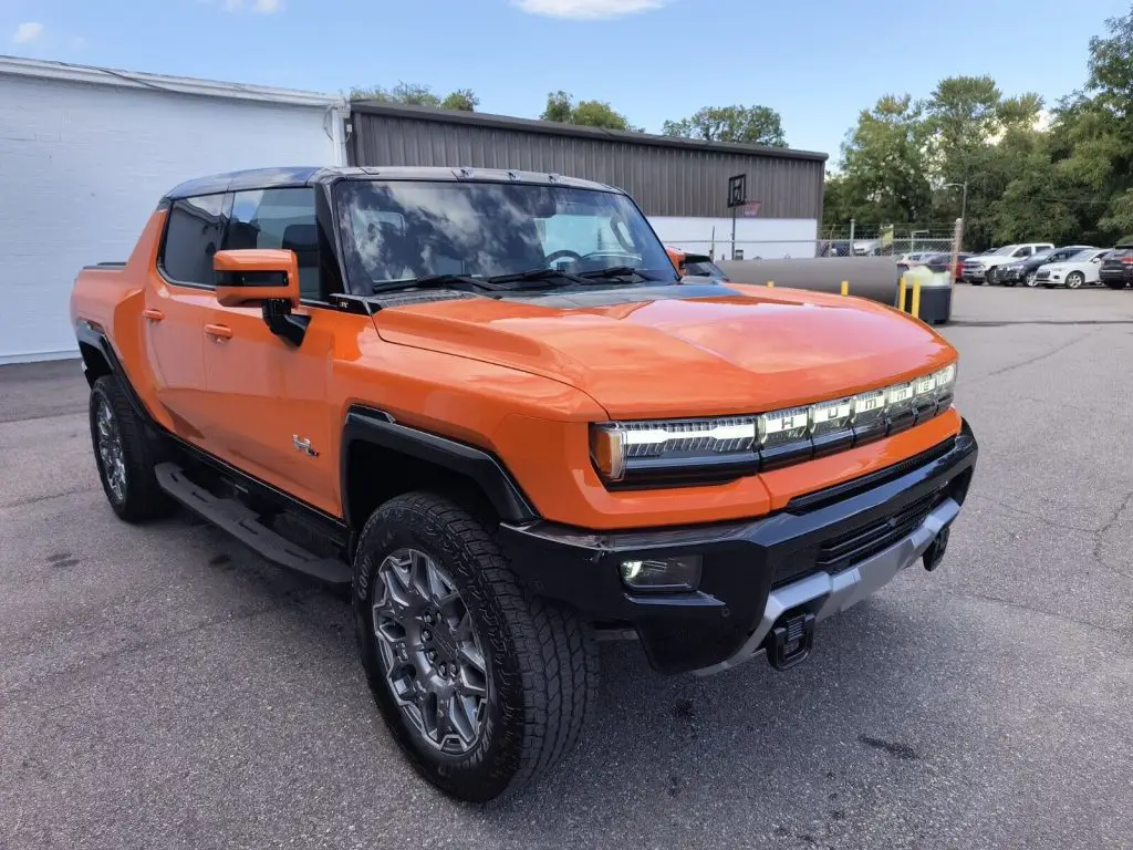 Very First HUMMER EV 3X Pickups Hit Dealership Lots... and eBay 2 2023 GMC HUMMER EV 3X Pickup in Afterburner Orange