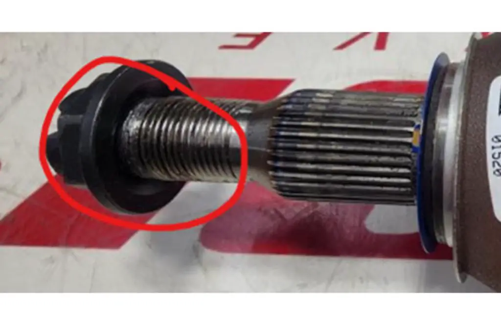 Never Use Power Tools To Remove A Wheel Drive Shaft Nut On These Chevrolet, Buick, Cadillac, and GMC Vehicles 2 The damage caused to a wheel drive shaft nut when removed using power equipment