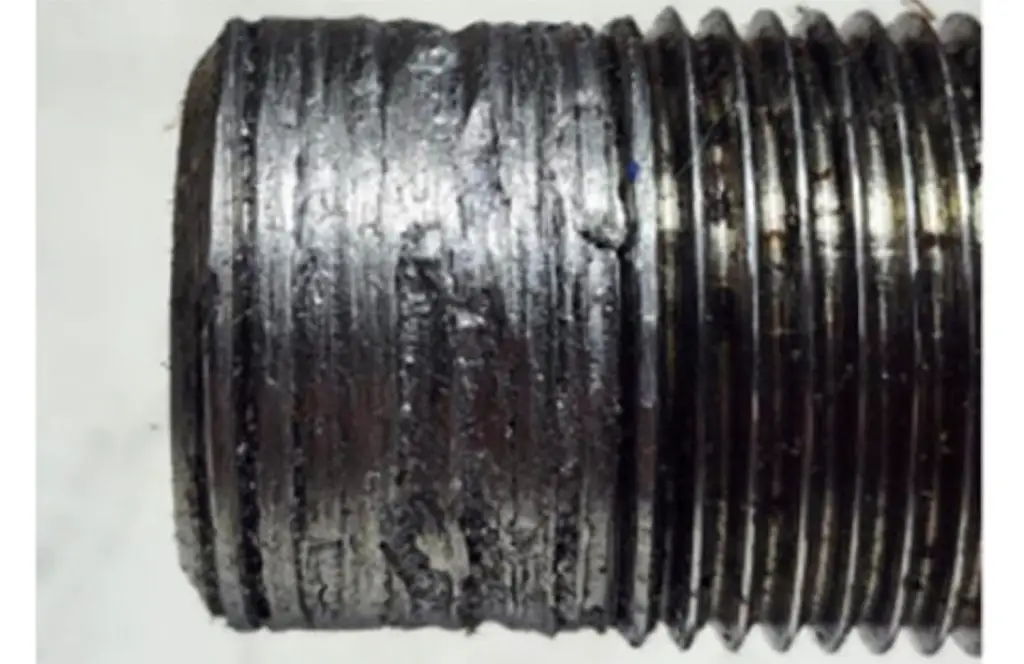 Never Use Power Tools To Remove A Wheel Drive Shaft Nut On These Chevrolet, Buick, Cadillac, and GMC Vehicles 3 The damage caused to a wheel drive shaft nut when removed using power equipment (Image Courtesy GM-Techlink)