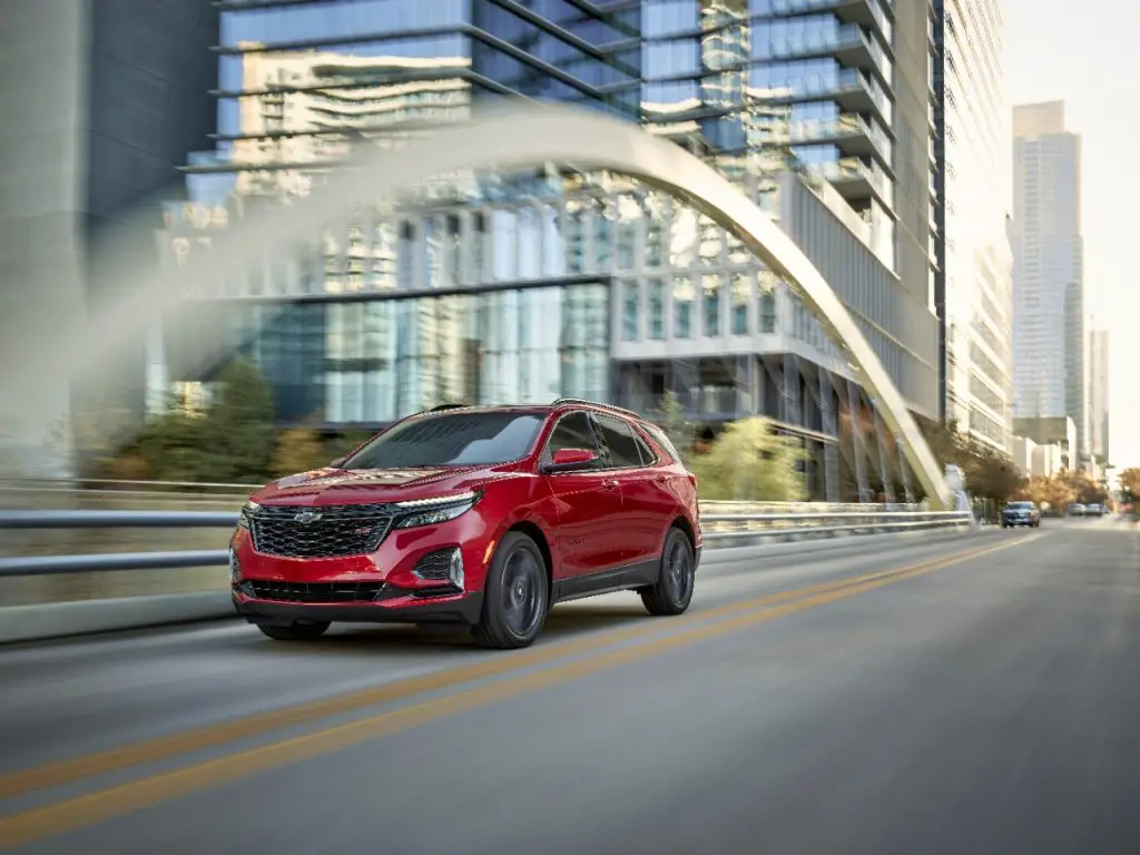 GM Issues Stop Sale Order For Blazer EV, Blazer, Equinox & Terrain 2 A red 2024 Chevrolet Equinox traveling over a bridge