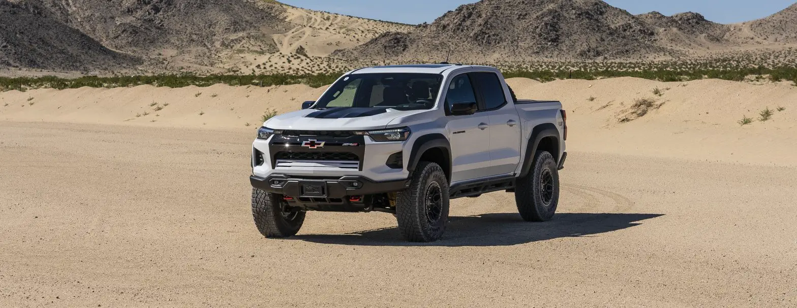 A white 2024 Chevy Colorado ZR2 in the desert of California