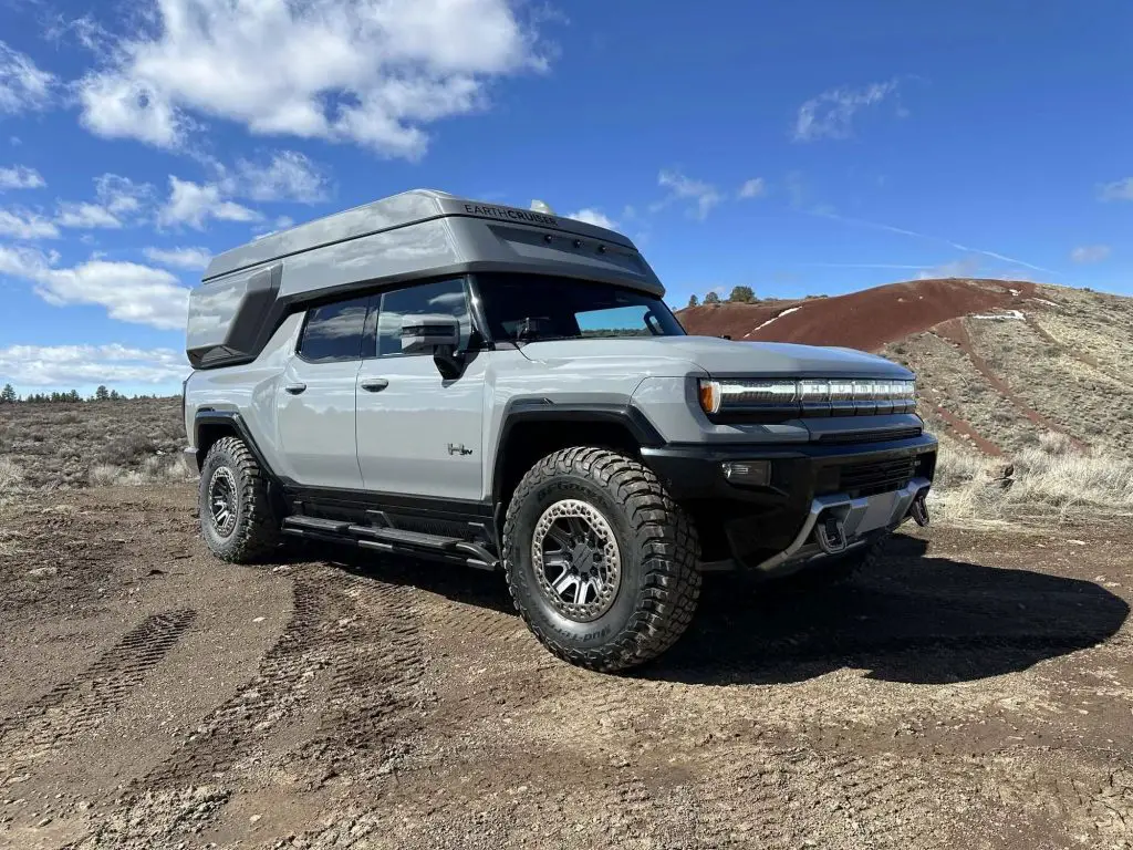 The EarthCruiser GMC HUMMER EV is built for overlanding and spending long weekends in the middle of the wilderness- in luxury. 