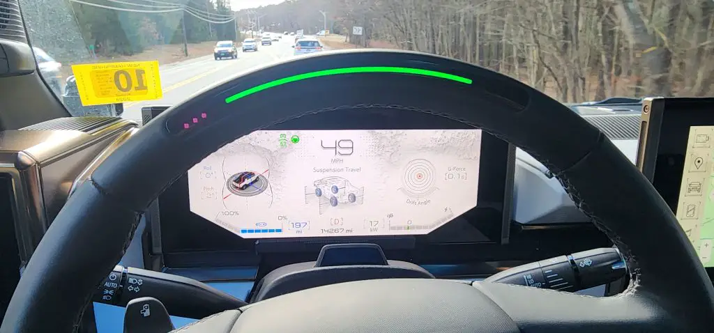 A driver's view from behind the wheel of a GMC HUMMER EV while using Super Cruise Hands-Free Driving