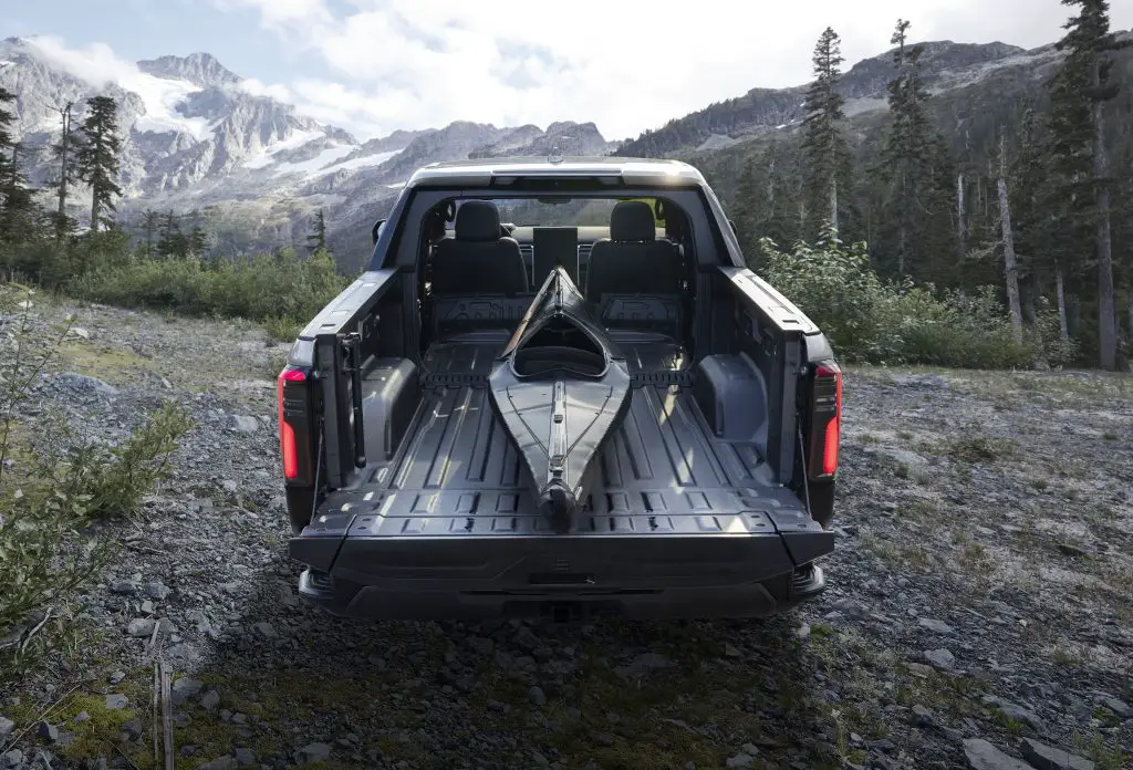GMC Sierra EV Denali Launch Goes Completely Sideways 5 The all-new MultiPro Midgate expands the usable bed space up to 10-feet, 10-inches on the GMC Sierra EV Denali Edition 1, which can help accommodate longer items like a canoe.