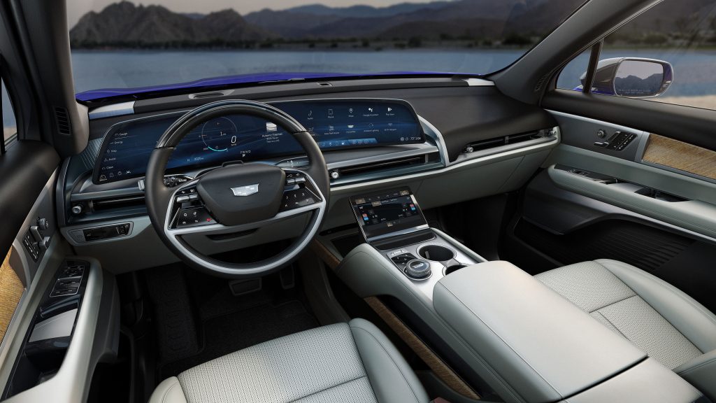 Cadillac's 2026 Vistiq EV: A Three-Row 'Baby Escalade' With 615 HP 3 Interior view of the 2026 Cadillac Vistiq EV showing the driver’s seat, steering wheel, and 33-inch LED dashboard display.