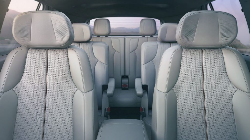 Cadillac's 2026 Vistiq EV: A Three-Row 'Baby Escalade' With 615 HP 5 Interior seating of the 2026 Cadillac Vistiq EV showing all three rows of premium leather seats.