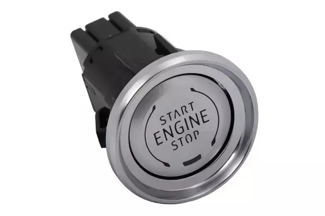 The Simple $43 Corvette Mod That's Driving Silverado & Sierra Owners Crazy 4 Studio close-up of the metallic C8 Corvette push-to-start button, GM part number 85007203, used for Chevrolet Silverado and GMC Sierra interior upgrades.