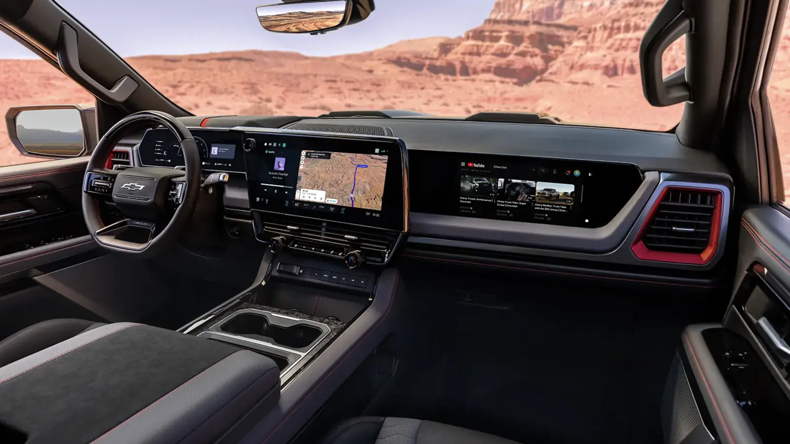 L76 and L78 Return: GM's New V8s Get Muscle Car Codes 2 2027 Chevrolet Silverado ZR2 interior with steering wheel, digital gauge cluster, large center touchscreen, and passenger display