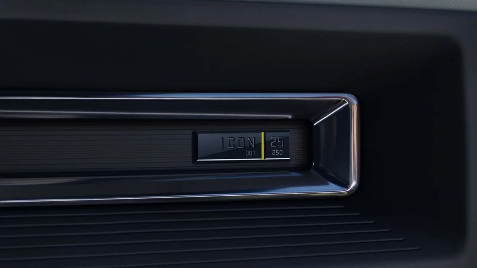Hummer Turns 25 and GMC Brought the H2's Yellow Back 3 Serialized ICON 25 badge on the instrument panel of a 2027 GMC HUMMER EV showing number 001
